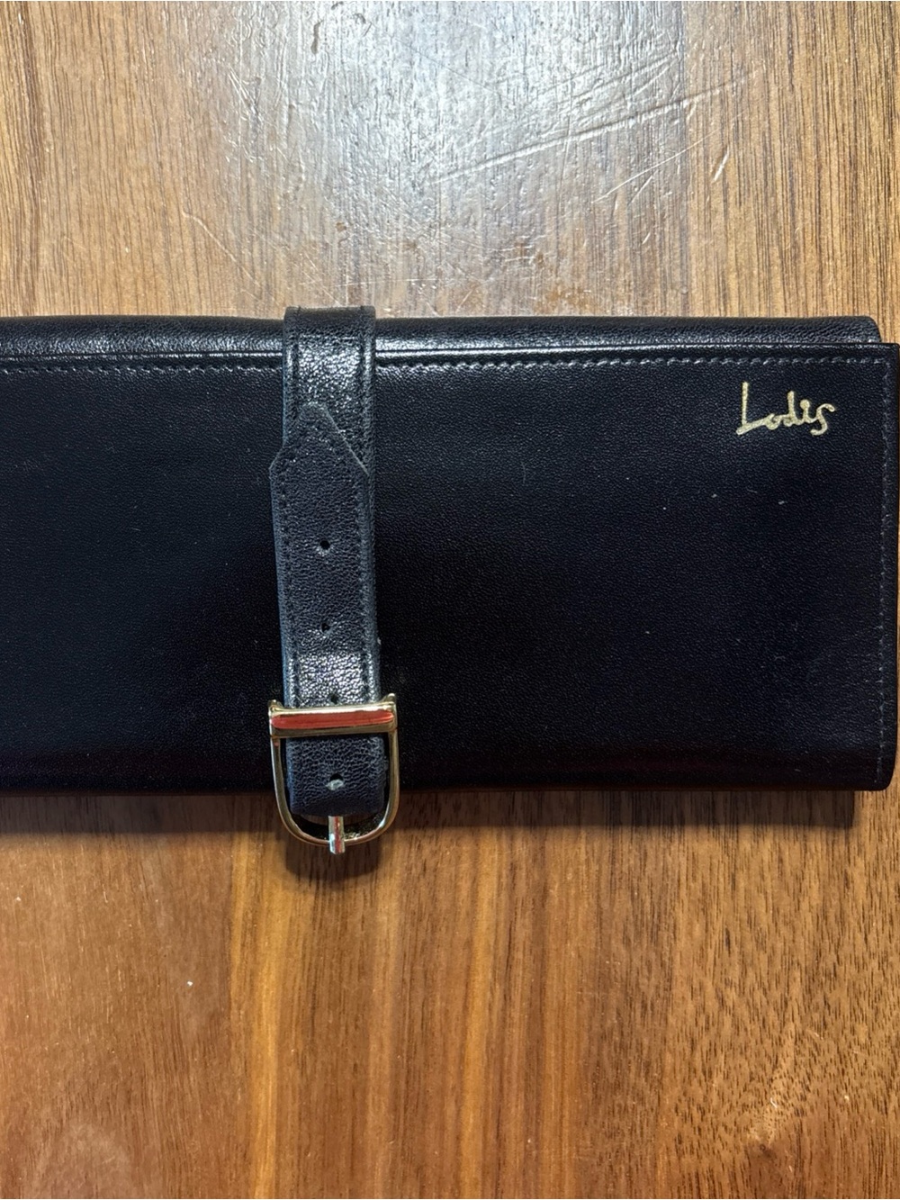 Lodis Black Leather Buckle jewelry roll with Gold Logo
